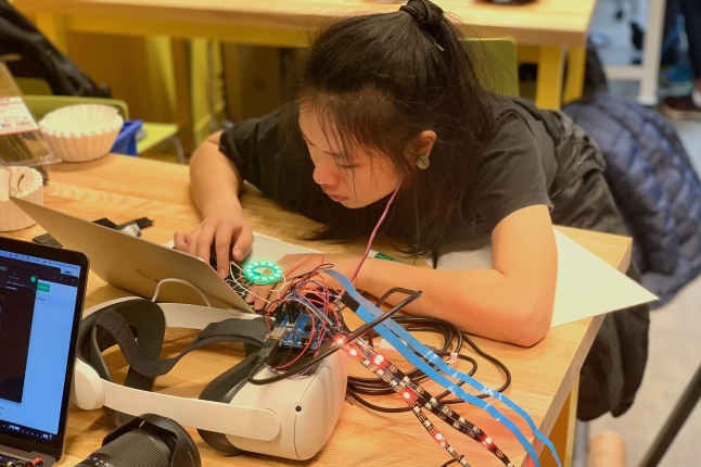 Alice Cai assembles a piece of the Nervous Network